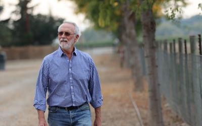 Congressman Dan Newhouse Walking on Farm