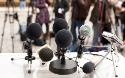 Microphones at a news conference