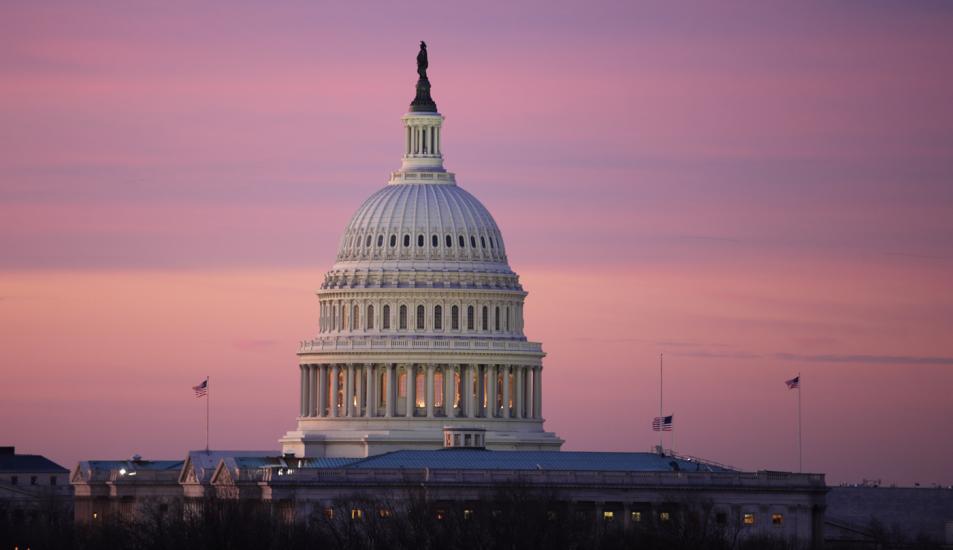 The United States capitol dome at dawn