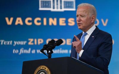 Pres. Joe Biden speaking at a podium